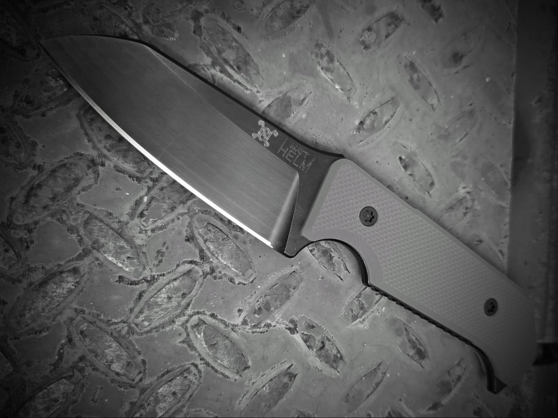 Picture of a knife sitting on a surface. 